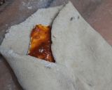 A picture of step 6 of Cheesy pizza sauce paratha.