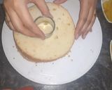 A picture of step 6 of Eggless Doll cake pineappple flavour.