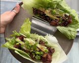 A picture of step 7 of Korean Black Bean Chicken Lettuce Wraps.