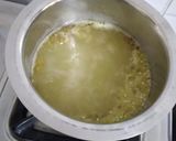 A picture of step 1 of Rice flour khichu.