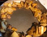A picture of step 2 of Sausage, ham and fried potato skillet topped with eggs.