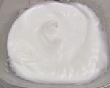 Foto del passaggio 4 della ricetta Stella di Natale di farina di mandorle profumata agli agrumi