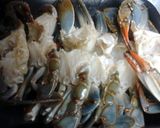 A picture of step 2 of blue crabs boiled.