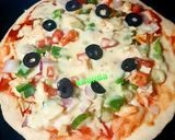 A picture of step 8 of Chicken tikka pizza.