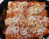 A picture of step 5 of Mexican Enchilada With black bean, cheese, black olives and etc. Stuffing.