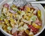 A picture of step 5 of Greek salad with ranch dressing.
