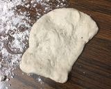 A picture of step 4 of Cheesy garlic bread meatball ring.