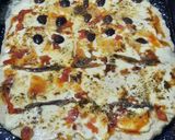 Foto del paso 9 de la receta: Pizza mitad anchoas, mitad olivas negras