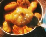 A picture of step 5 of Coconut Lobongo Lotika.