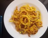A picture of step 3 of Tumeric onion rings.