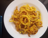A picture of step 3 of Tumeric onion rings.