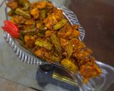 A picture of step 6 of Achari Chicken Bindi.