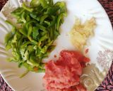 A picture of step 1 of Aloo & Shimla Mirch.