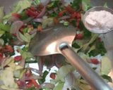 A picture of step 4 of Leftover fried rice in cabbage cups.