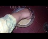 A picture of step 3 of Australian cake.. chocalate toping on vanilla cake.