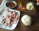 A picture of step 3 of Smokie pizza.