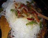 A picture of step 3 of Singapore noodles/ rice sticks.