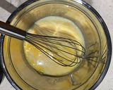 A picture of step 3 of Lemon and blueberry drizzle muffins.