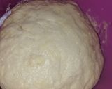 A picture of step 2 of Vanilla cream filled doughnuts.