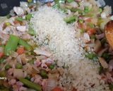 Foto del paso 4 de la receta: Arroz con conejo desmigado y verduras