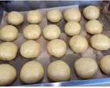 A picture of step 12 of Coconut Sesame Seeds Dinner Rolls.