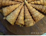A picture of step 2 of Cheesy corn cone.