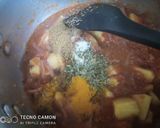 A picture of step 3 of Aloo bengan.