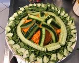 Une image de l'étape 7 de Salade de concombre et carottes râpées à la roquette et feta.