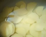 A picture of step 1 of Pickles chilli potatoes.