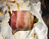 A picture of step 6 of Bacon 🥓 Wrapped BBQ 🍖 Jalapeño Poppers.