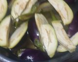 A picture of step 1 of Aloo brinjal.