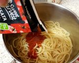 A picture of step 3 of My Quick Spaghetti in tomato juice and homemade Cheese sauce.😀.