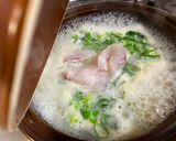 A picture of step 6 of Japanese Zousui (seasoned rice-porridge with fish).