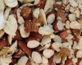 A picture of step 4 of Gazar Ka halwa with Rabadi and gulab jamun.