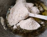 A picture of step 1 of Whole wheat flour Halwa.
