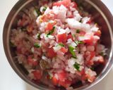 A picture of step 2 of Onion-Tomato Salad.