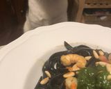 A picture of step 5 of Squid Ink Tagliolini with Grilled Shrimp, Mustard Pesto, and Toasted Pine Nuts.