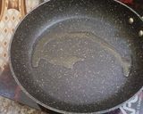 A picture of step 14 of Chicken tandoori tikka boti in frying pan.