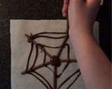Foto del paso 2 de la receta: Telaraña viviente (Mikados con chocolate y lacasitos) - Adviento Halloween