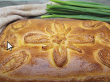 Empanada de cebolleta o cebolla de verdeo con huevo duro
