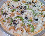 A picture of step 11 of Chicken Tikka Pizza.