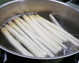 Foto del paso 9 de la receta Guisantes frescos con jamón y huevo poche