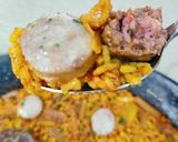 Foto del paso 7 de la receta: Arroz con figatells, blanquets y ajos tiernos