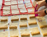 Foto del paso 8 de la receta: Canelones de carne navideños
