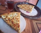 صورة لخطوة 10 من وصفة فطيره الجبنه البيضاء وحبه البركه 😋😋😋