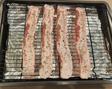 A picture of step 1 of Sweet and Spicy Candied Bacon.