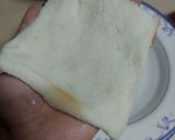 A picture of step 2 of Cheese pull Pizza bread bomb.