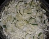 A picture of step 2 of White rice sprinkled with carrot,Chicken stew and veggies.