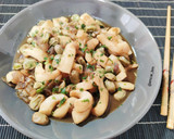 Foto del paso 7 de la receta: Wok de calamar con habas sabor oriental