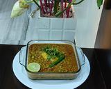 A picture of step 2 of Mutton mince with green peas potato.